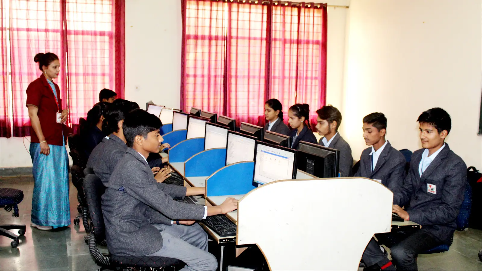 Children at workstations in the school computer laboratory