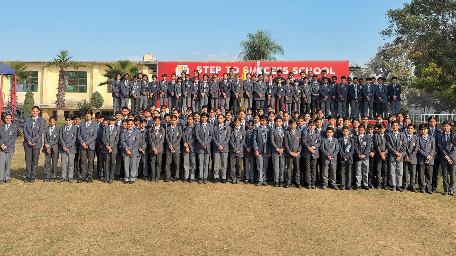 Students of Step to Success School gathered in the school grounds